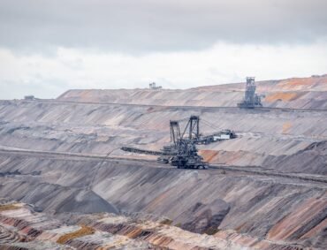 A wide angle shot of excavation machines in the Lookout Jackerath Garzweiler Skywalk in Germany
